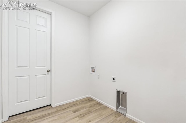 laundry area featuring hookup for a washing machine, hookup for an electric dryer, laundry area, baseboards, and light wood-style floors