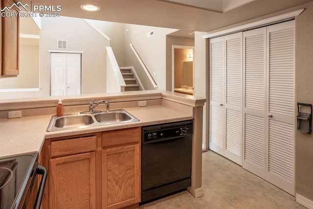 kitchen with range with electric cooktop, a sink, visible vents, light countertops, and dishwasher