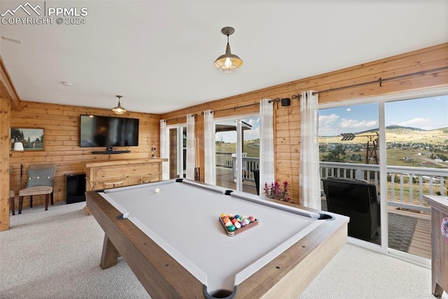 game room featuring wood walls, pool table, and light colored carpet