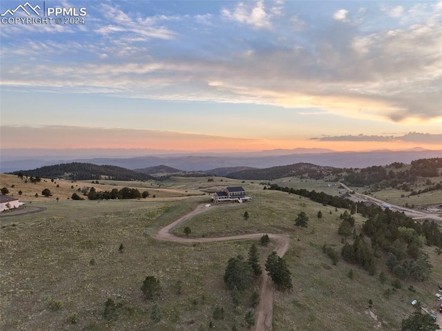 mountain view featuring a rural view