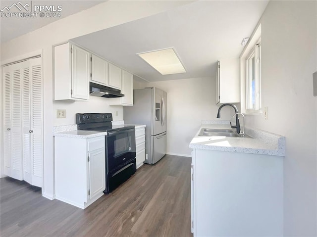 kitchen featuring dark wood-type flooring, white cabinetry, black electric range oven, and sink