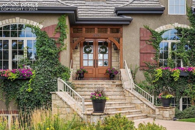 entrance to property featuring french doors