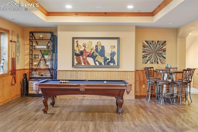 playroom featuring hardwood / wood-style flooring, a tray ceiling, and pool table