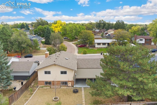 birds eye view of property with a residential view