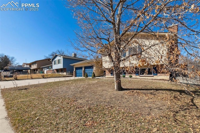 view of front facade with an attached garage and concrete driveway