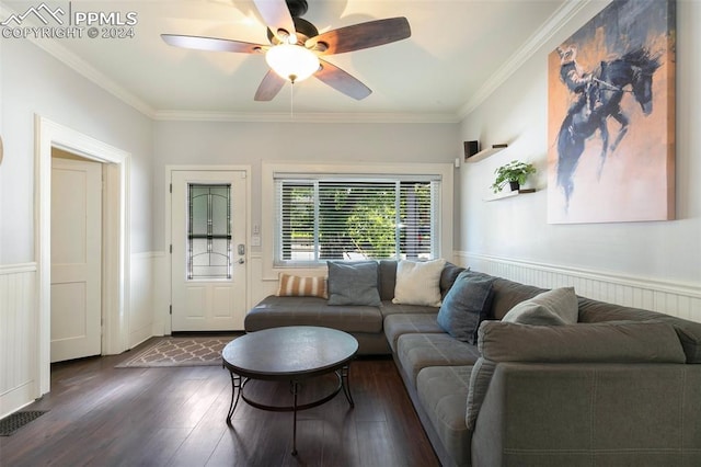 living room featuring ornamental molding, ceiling fan, and dark hardwood / wood-style floors