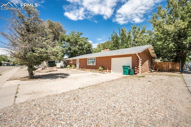 exterior space with a garage