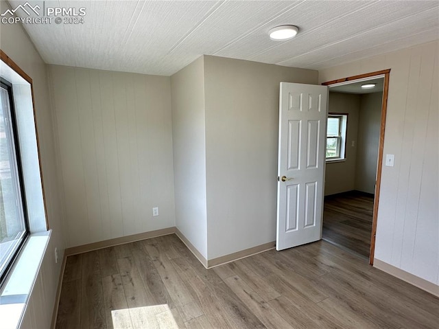 unfurnished room featuring light hardwood / wood-style floors