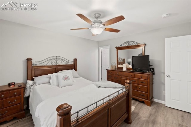 bedroom featuring ceiling fan and light wood-type flooring