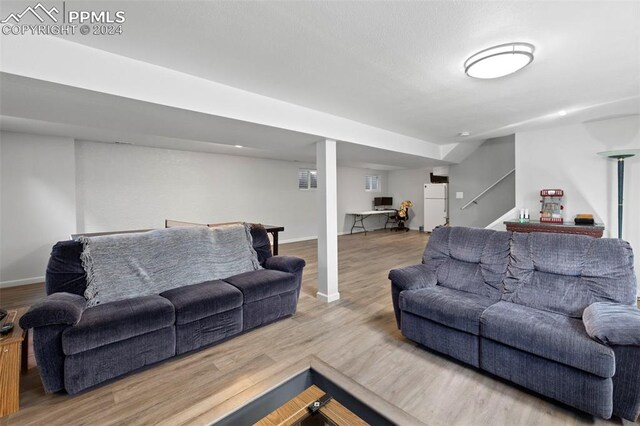 living room with light hardwood / wood-style floors