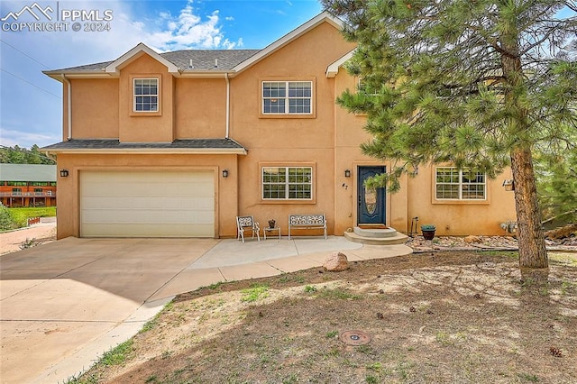 view of front of property featuring a garage