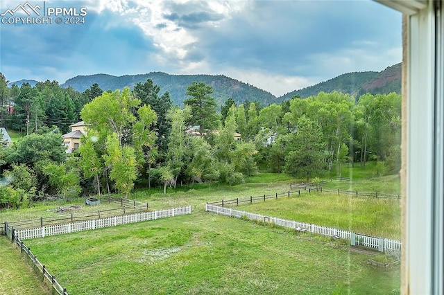 view of mountain feature featuring a rural view