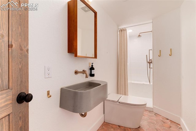 full bathroom with toilet, sink, shower / tub combo, and tile patterned floors