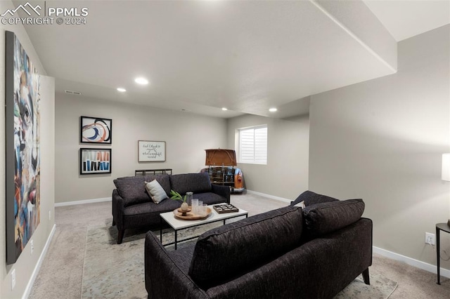 living room featuring light carpet