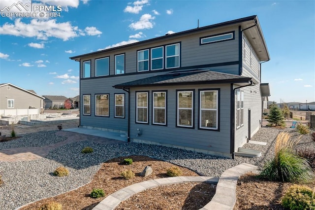 view of front of property featuring a patio