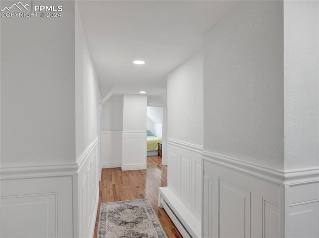 corridor featuring light hardwood / wood-style flooring