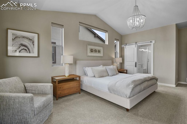 carpeted bedroom featuring lofted ceiling, connected bathroom, and a notable chandelier