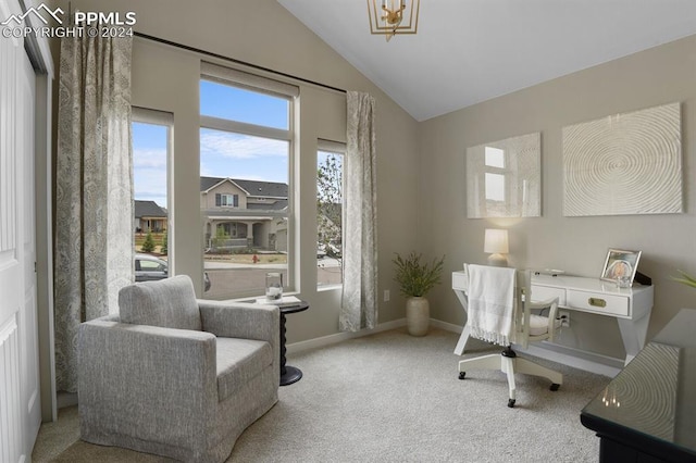 office area with plenty of natural light, carpet, and high vaulted ceiling