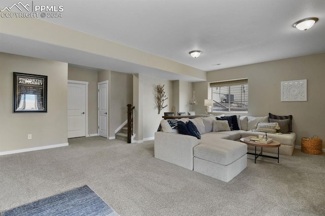 living room featuring light colored carpet