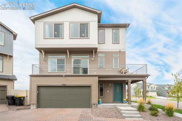 view of front of property with a garage