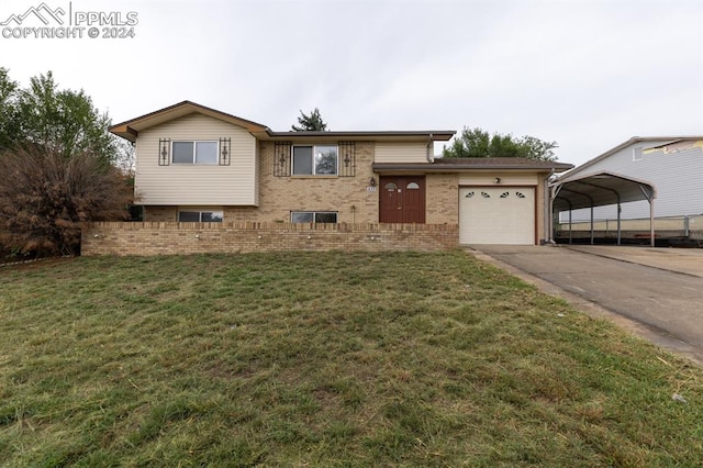 view of front of house featuring a garage, a front yard, and a carport