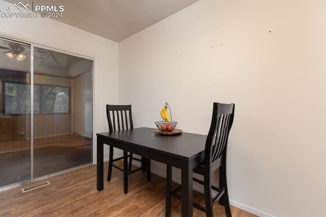 dining space featuring hardwood / wood-style floors