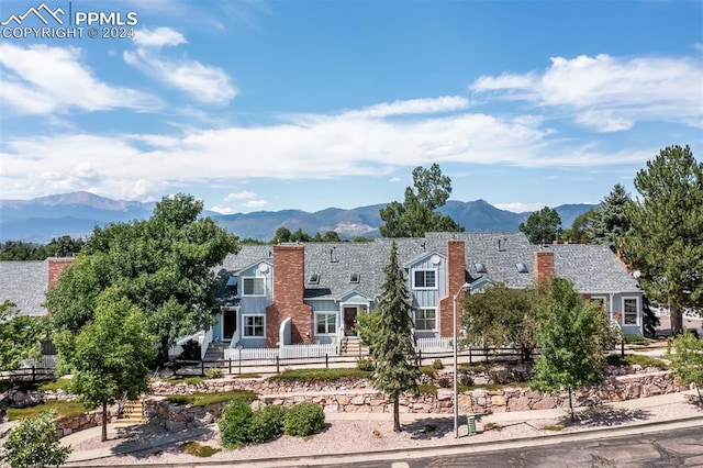 view of front of home with a mountain view