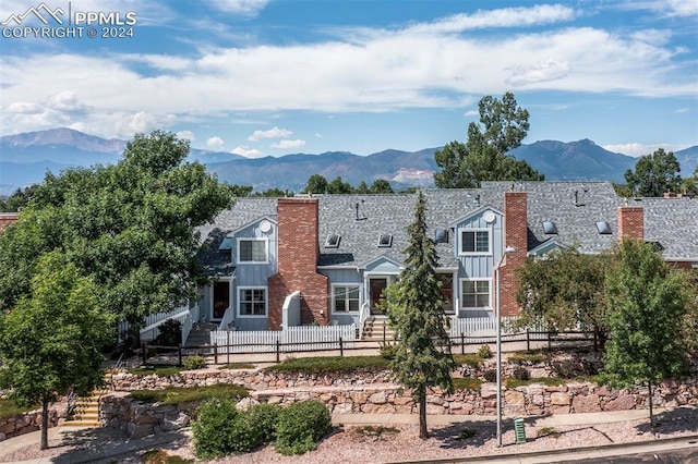 view of front of home featuring a mountain view