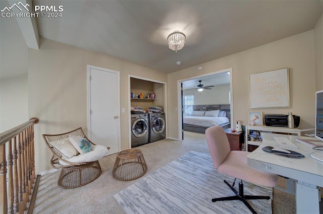 home office with ceiling fan, washing machine and clothes dryer, and light carpet