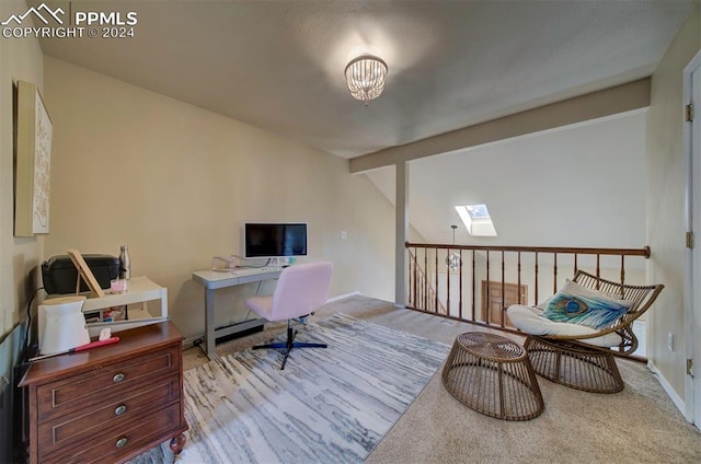 carpeted office space featuring a skylight