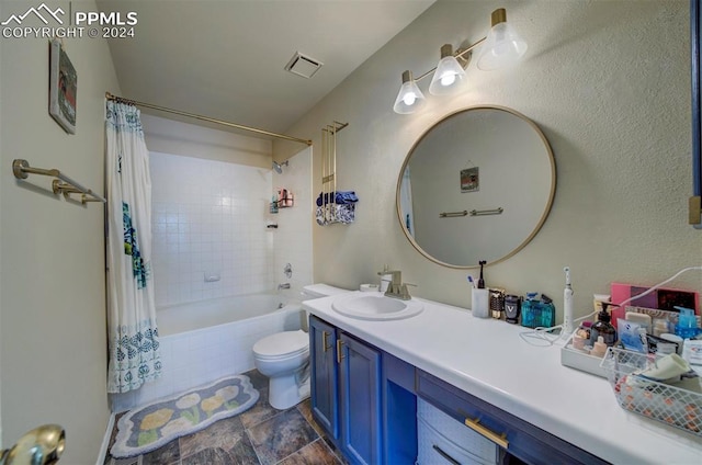 full bathroom featuring vanity, toilet, and shower / tub combo with curtain