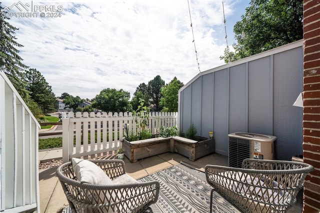 view of patio with central air condition unit