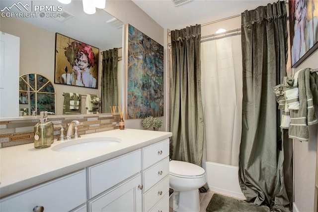 full bathroom with tile patterned floors, toilet, shower / bath combination with curtain, decorative backsplash, and vanity