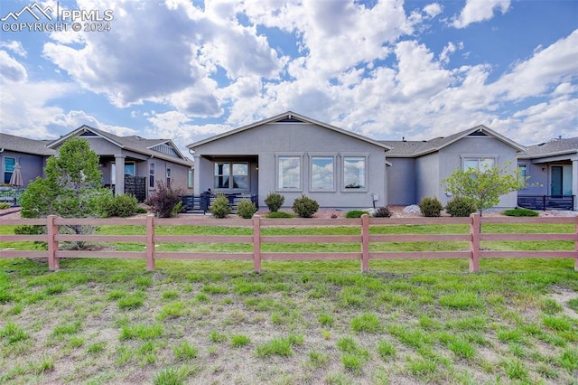 view of front of home with a front yard