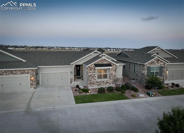 view of front of property featuring a garage