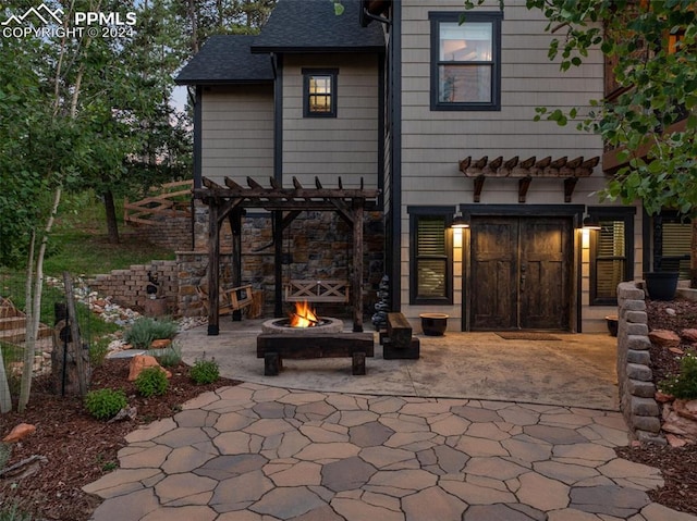 view of patio / terrace with a fireplace