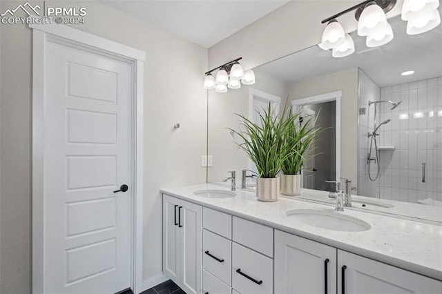 bathroom with vanity and walk in shower