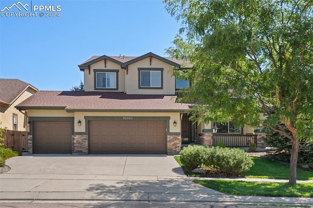 craftsman inspired home with a garage