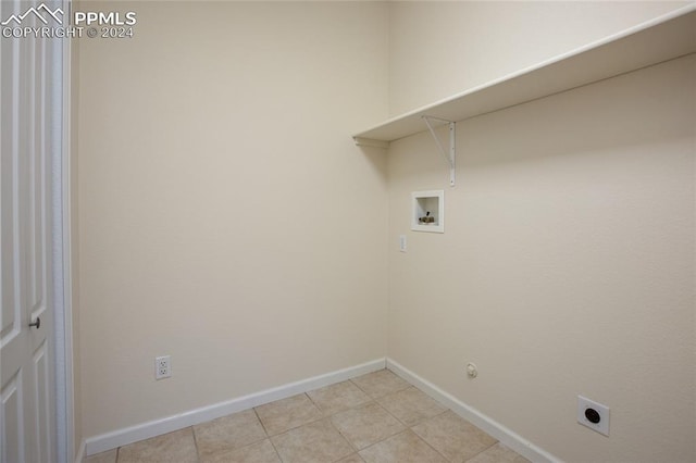 laundry room with hookup for a washing machine, light tile patterned flooring, electric dryer hookup, and gas dryer hookup