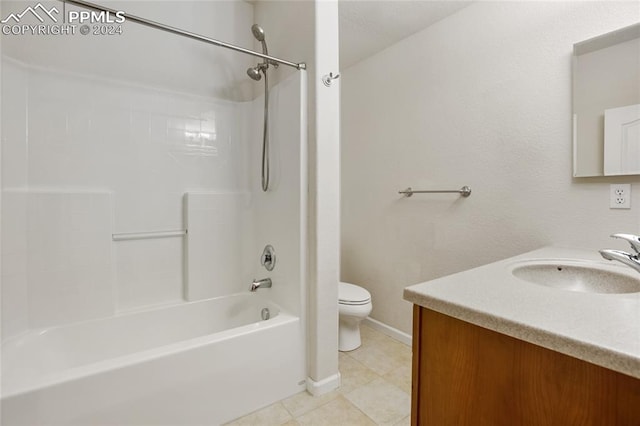 full bathroom with tile patterned floors, shower / bathtub combination, vanity, and toilet