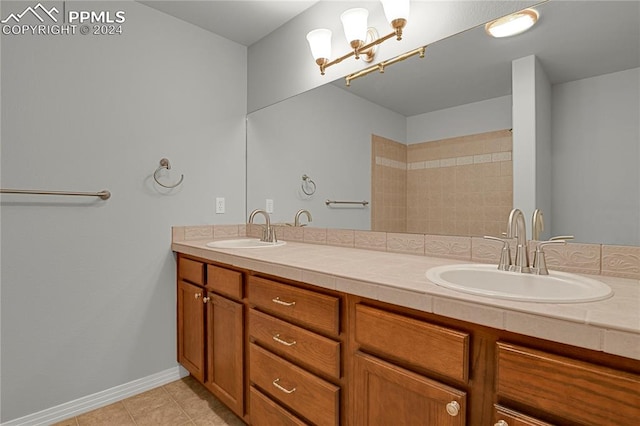 bathroom featuring tile patterned floors and vanity