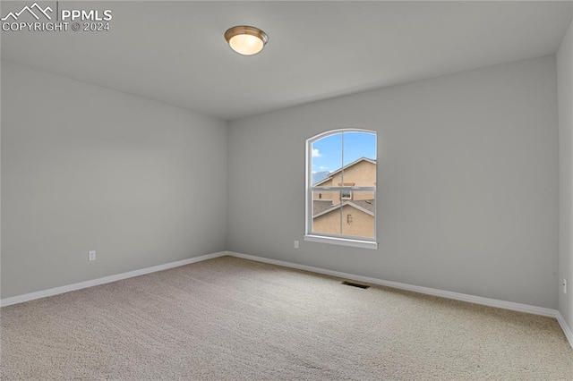 view of carpeted spare room