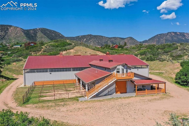 exterior space featuring a mountain view