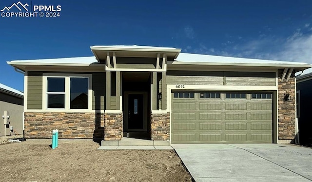 view of front of house with a garage and driveway