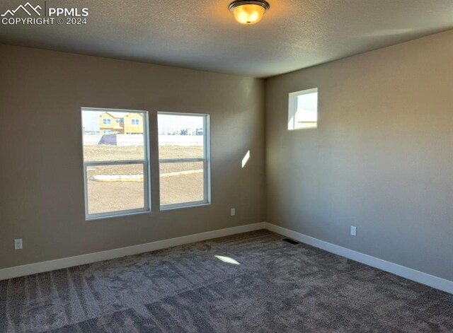 unfurnished bedroom featuring a closet and carpet