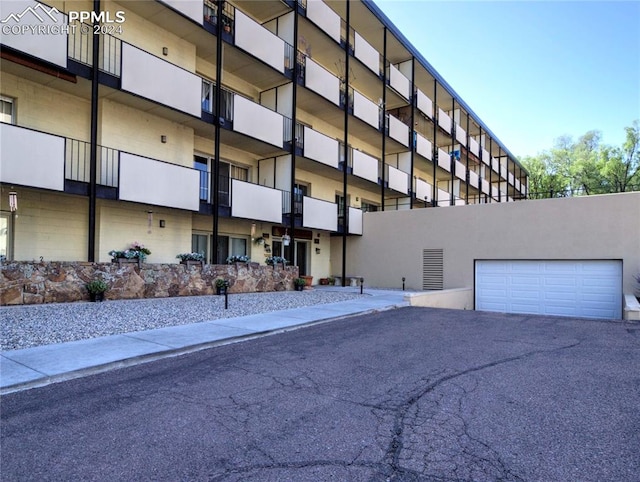 view of property featuring a garage