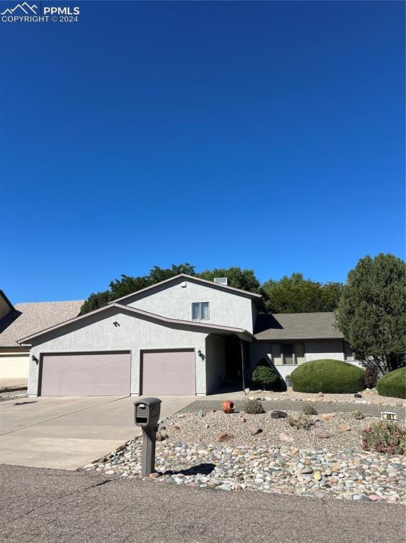 view of front of house with a garage