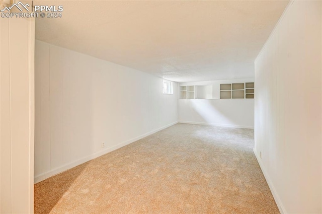 2459 E Willamette Ave, Colorado Springs, CO 80909 - basement with carpet flooring and baseboards