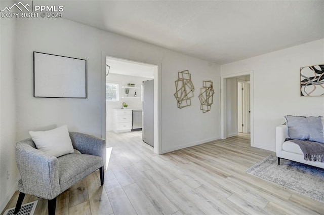 living area featuring light hardwood / wood-style floors