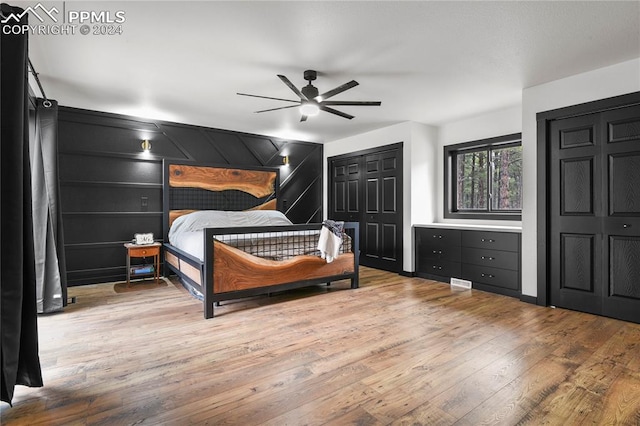 bedroom featuring hardwood / wood-style flooring and ceiling fan